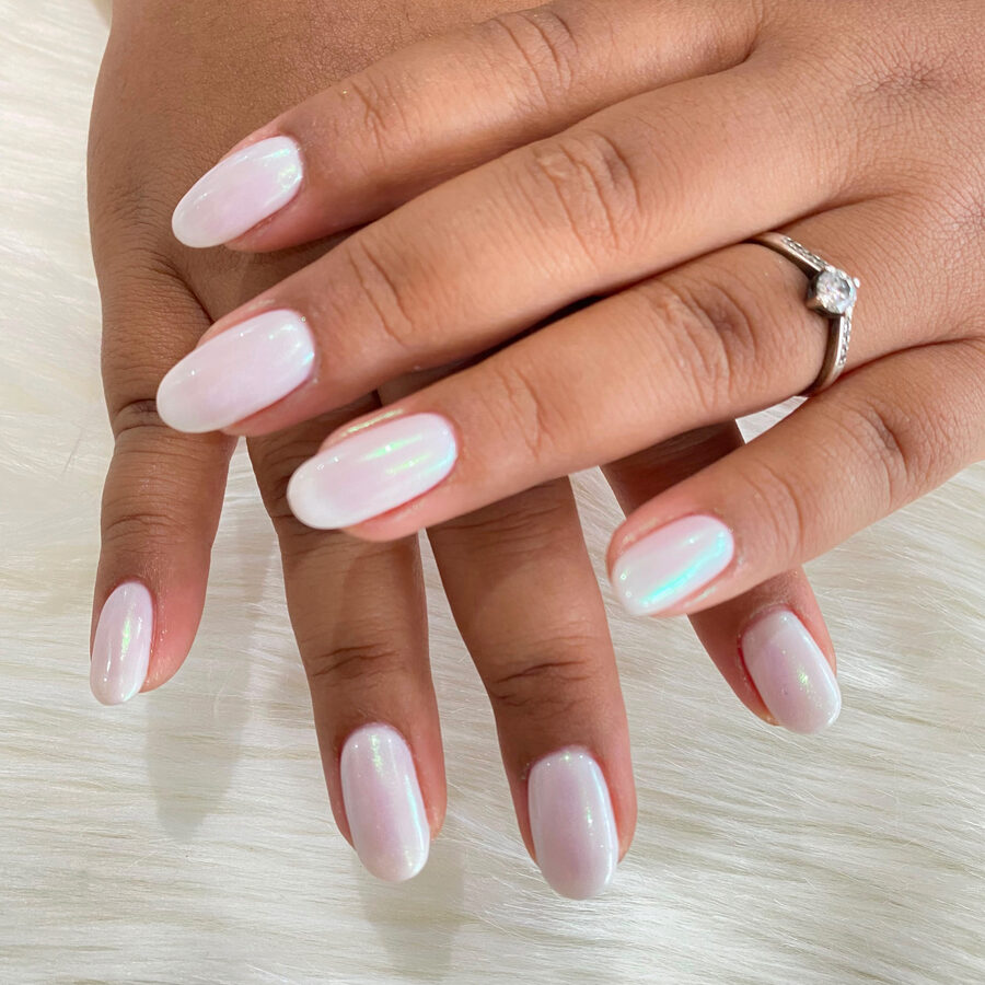 Chrome pearl gel nails done in Denpasar, Bali